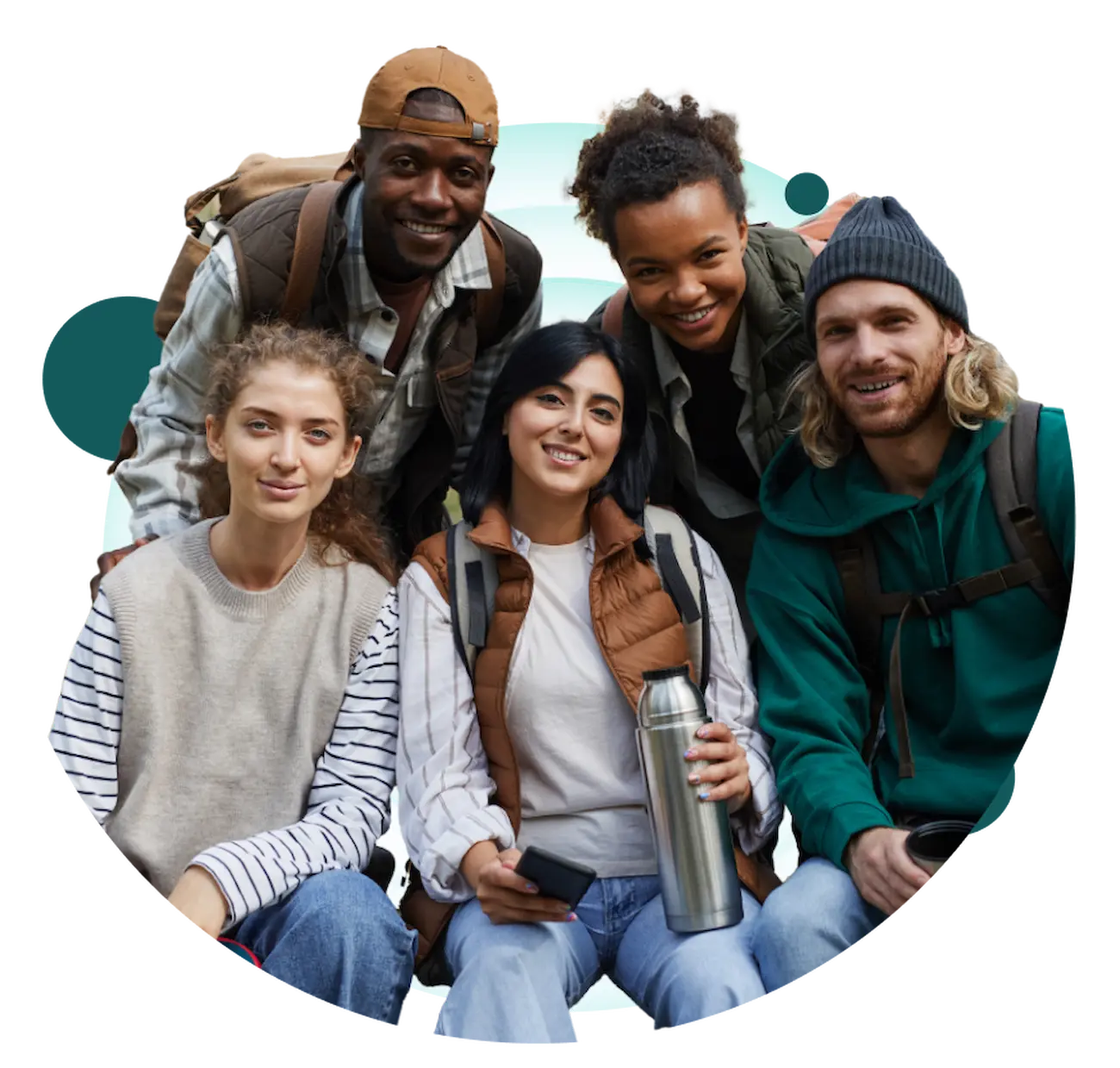 Group of five friends smiling together outdoors